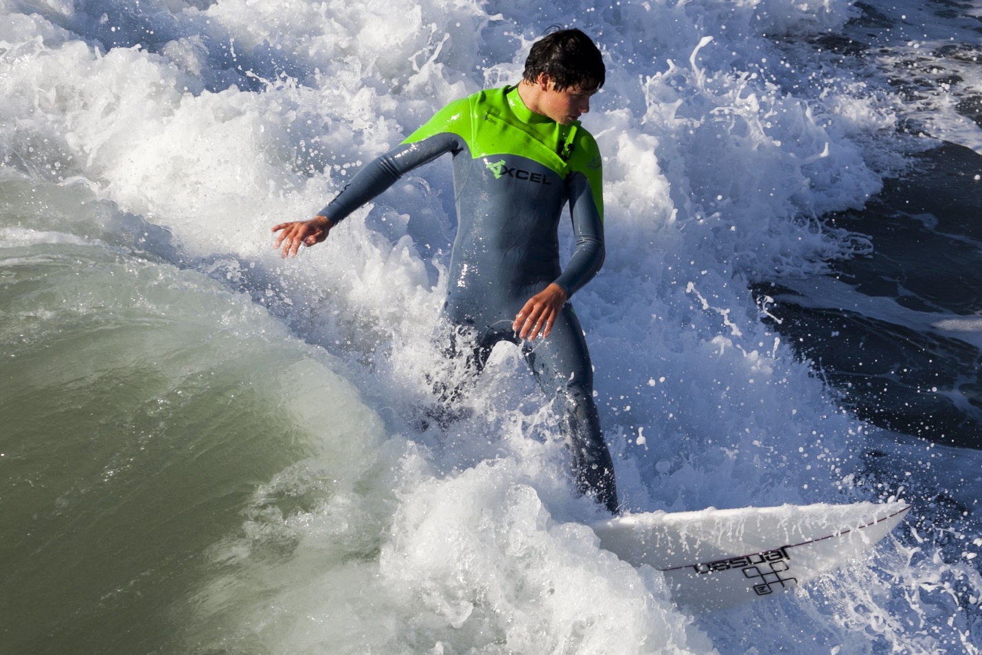 A person surfing on a wave

Description automatically generated