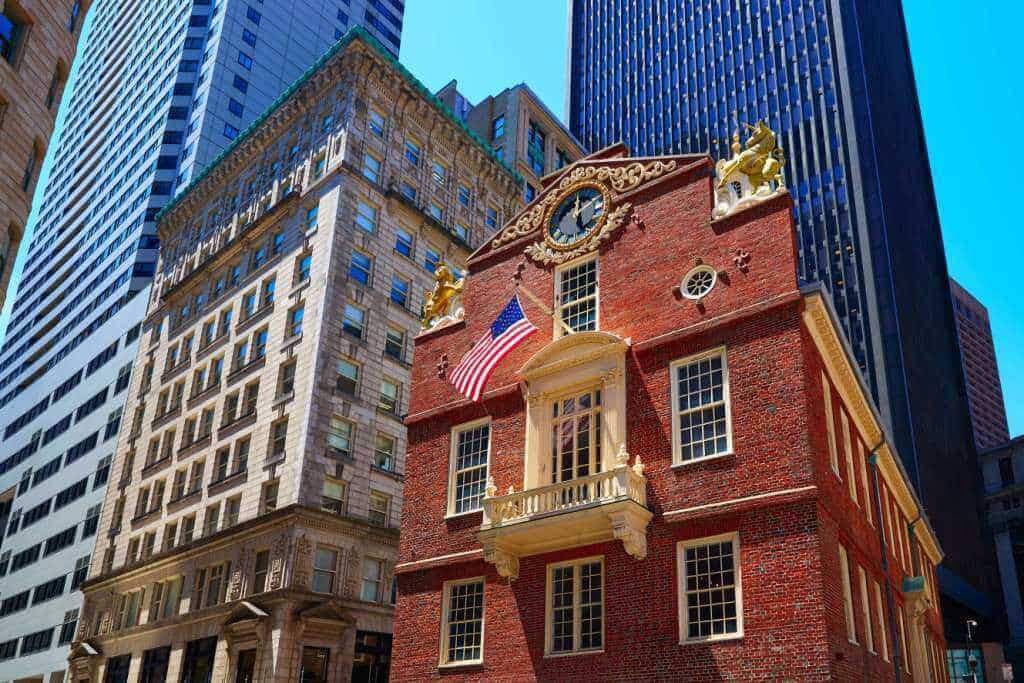 Old State House with a flag on the front

Description automatically generated