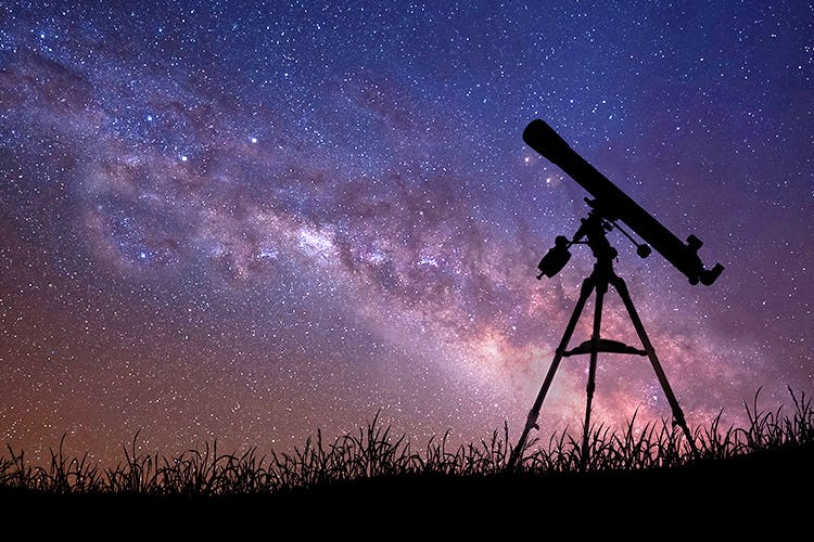 Astronomical telescope capturing night sky